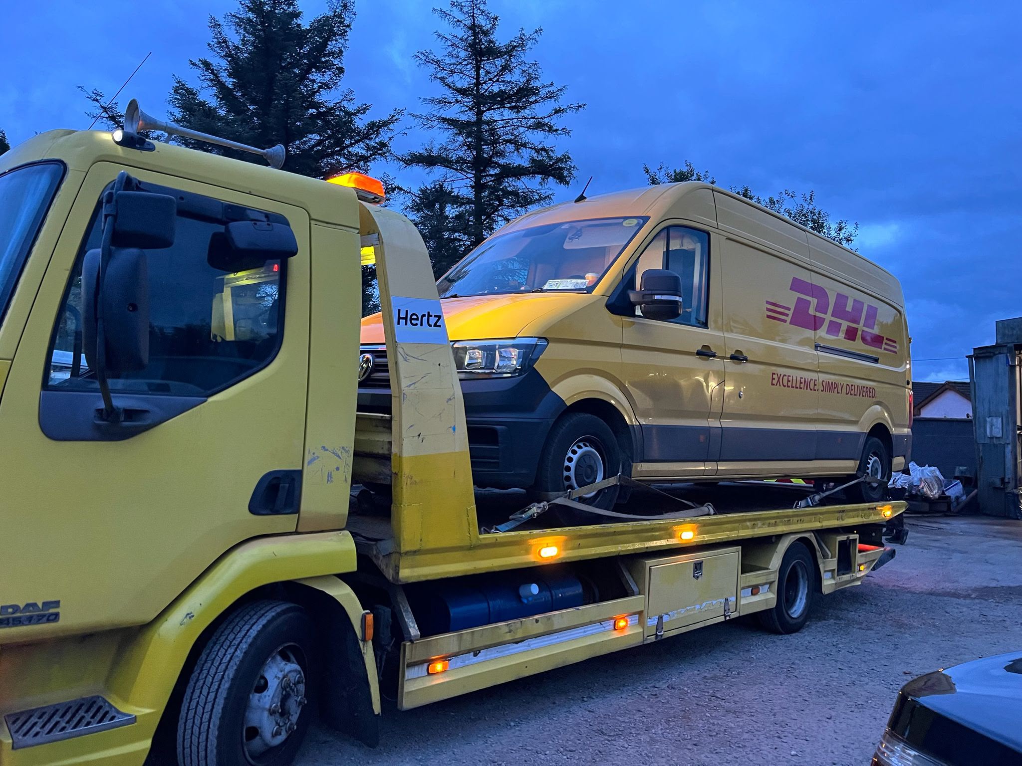 RRecovery Truck transporting a commercial van
